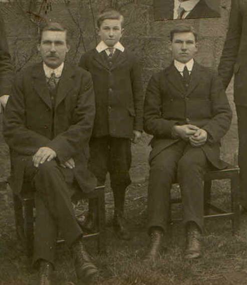 A group of men in suits
Description automatically generated